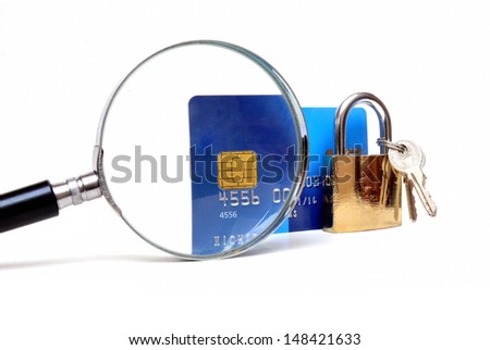 Secure banking and online shopping, credit card and padlock with magnifying glass