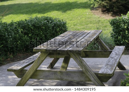 picnic table within garden landscape. beautiful photo with copyspace