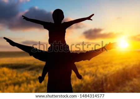 Happy man rise hand on morning view. Christian inspire praise God on good friday background. Male self confidence empowerment on mission arm courage nature the sun concept strength wisdom Royalty-Free Stock Photo #1484314577
