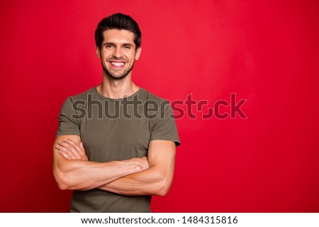 Photo of friendly chief hold hands crossed wear casual grey t-shirt isolated on red background