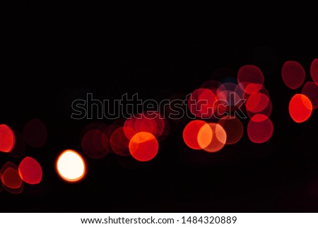 Night lights abstract, city traffic. Blurred image of Cityscape with beautiful bokeh,  at night time, for background 