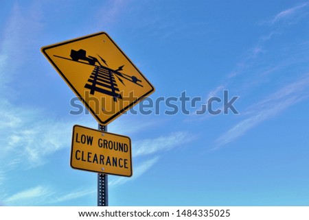 Low ground clearance at railroad tracks Royalty-Free Stock Photo #1484335025