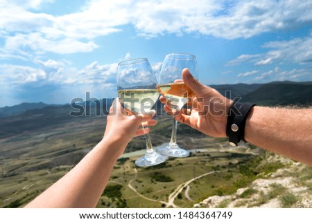 glass of wine on the background of the sea and mountains, beautiful romance holiday