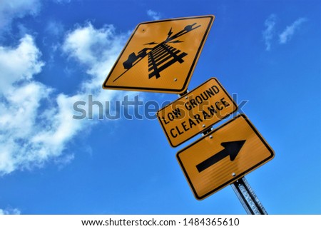 Low ground clearance at railroad tracks Royalty-Free Stock Photo #1484365610