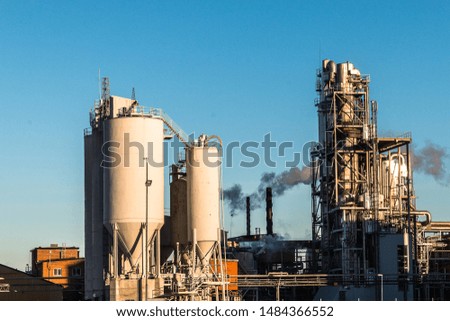 Environmental pollution concept. Pollution and smoke from chimneys of factory or power plant.