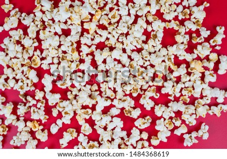 Top above high angle overhead closeup view photo of tasty popcorn isolated over vivid color background