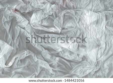 Creative fantasy gray and white background. Crumpled paper texture. Suitable for poster, wallpaper, covers, design. Clean, crumpled background