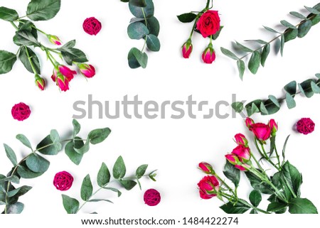 Isolated white background with flowers. Flat lay, top view.