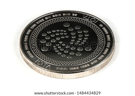 Face of the crypto currency silver iota isolated on white background. High resolution photo. Full depth of field.