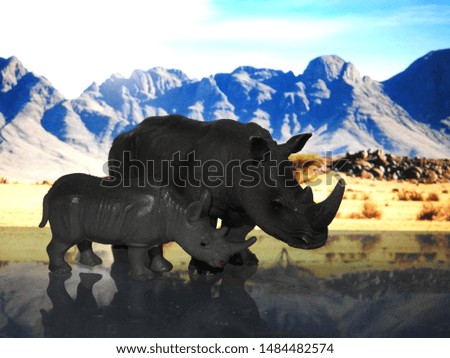Picture of a Toy rhinoceros on Safari background