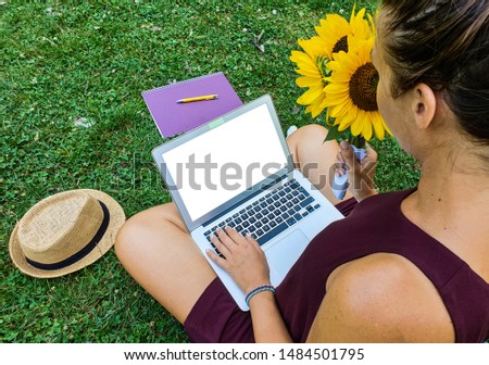 Enjoying of work and coffee stock photo germany love nature smiling hat flower hairstyle eyeglasses coffee camera laptop computer book  and books student 