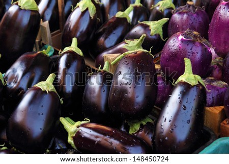 fresh aubergines Royalty-Free Stock Photo #148450724