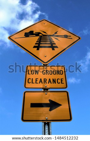 Low ground clearance with arrow Royalty-Free Stock Photo #1484512232