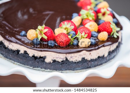 Cheese cake with organic berries (blueberries, strawberries and raspberries)