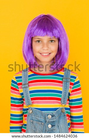 Anime fan. Cosplay kids party. Child cute cosplayer. Cosplay outfit. Otaku girl in wig smiling on yellow background. Cosplay character concept. Culture hobby and entertainment. Happy childhood.