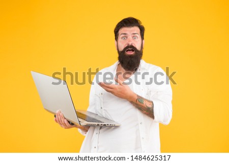Programmer with laptop. Bearded man with notebook. Online shopping. Man using notebook. Surfing internet. In search of inspiration. Online payment. Online purchase. Digital world. Programming concept.