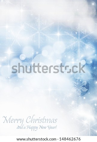Light blue abstract Christmas background with white snowflakes