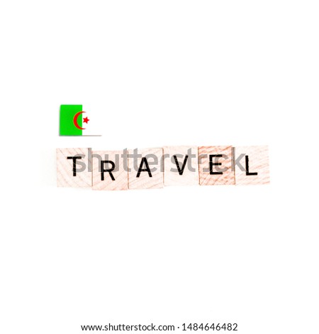 The Flag of Algeria and "TRAVEL" Wooden Block Letters