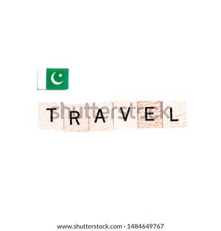 The Flag of Pakistan and "TRAVEL" Wooden Block Letters