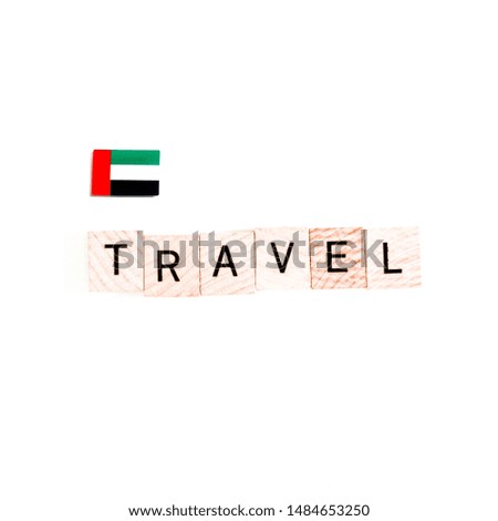 The Flag of United Arab Emirates and "TRAVEL" Wooden Block Letters