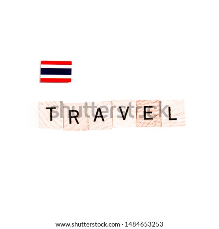 The Flag of Thailand and "TRAVEL" Wooden Block Letters