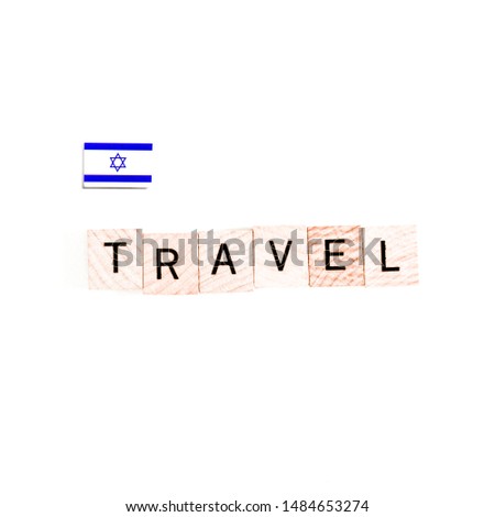 The Flag of Israel and "TRAVEL" Wooden Block Letters