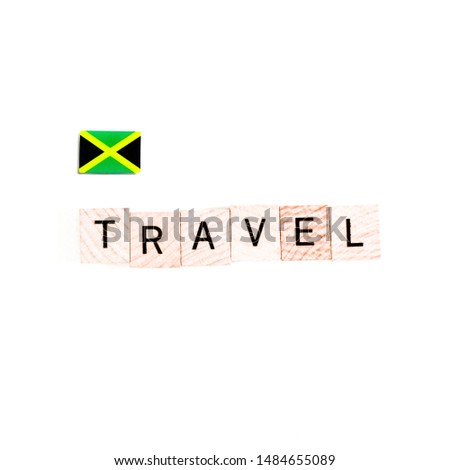 The Flag of Jamaica and "TRAVEL" Wooden Block Letters