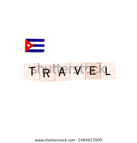 The Flag of Cuba and "TRAVEL" Wooden Block Letters