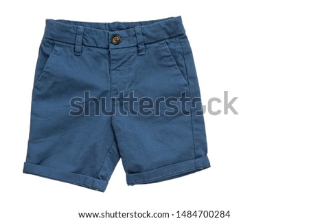 Blue shorts for boy isolated on white background/ Top view/ Flat lay/ Baby clothes Royalty-Free Stock Photo #1484700284
