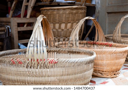  bamboo baskets on the shop table Royalty-Free Stock Photo #1484700437