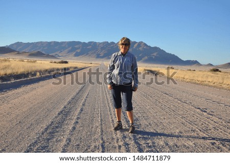 Portrait of adult woman in the namib desert