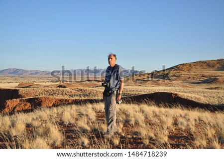 Portrait of an adult man in the desert
