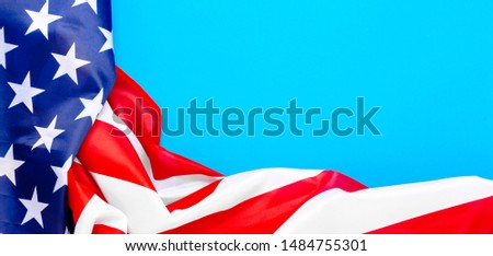 USA flag on a blue background. United States. Concept Memorial Day, Independence Day, July 4th. Flat lay, top view