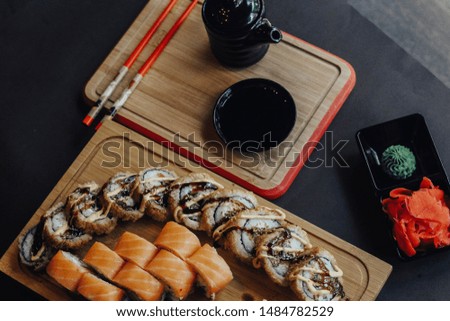 Japanese Cuisine in Springtime Sushi roll sets and delicious Restaurant Background