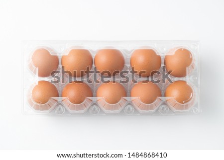 Egg packaging There are eggs arranged in packs, separate on a white background.