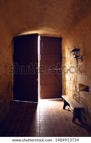 The door of castle in France. Couiza. Light and dark.