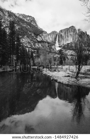 Yosemite fall reflection with the water during winter season in black and white