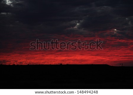 red sunset with clouds