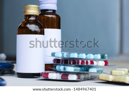 Capsule pills with medicine antibiotic in packages.