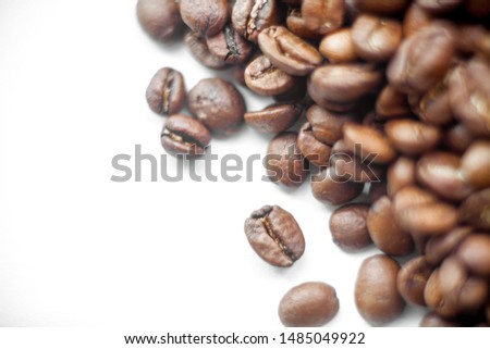 Roasted coffee beans heap background. Close up macro photoshoot