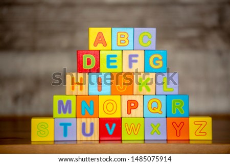 Colorful wooden alphabet, education concept photo.