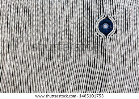 light bulb pop up in middle of nylon string pattern background