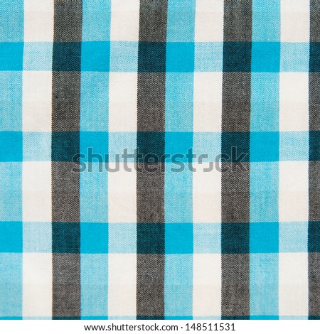 blue, black and white checkered pattern texture. Abstract background 