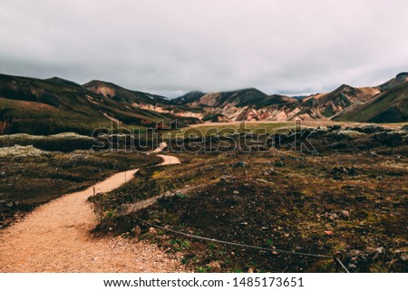 Breathtaking highlands landscape  background with colorful mountains green moss Icelandic pure natural fields and lakes craters rivers aerial view Landmannalaugar geothermal area Iceland and camp site