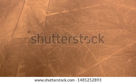 Aerial airplane panoramic view to Nazca geoglyph lines aka Condor, Ica region, Peru