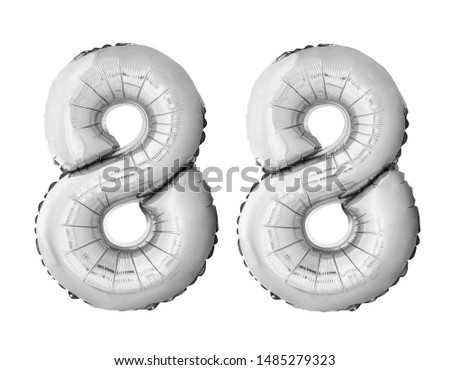 Number 88 eighty eight of silver inflatable balloons isolated on white background. Silver chrome helium balloons forming 88 eighty eight number