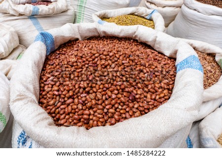 Bags full of beans on a market