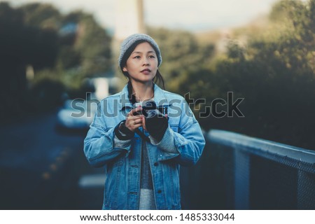 Female photographer taking photo in Wellington,New Zealand