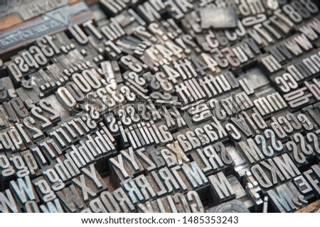 Loose letters from typeset of ancient typewriter