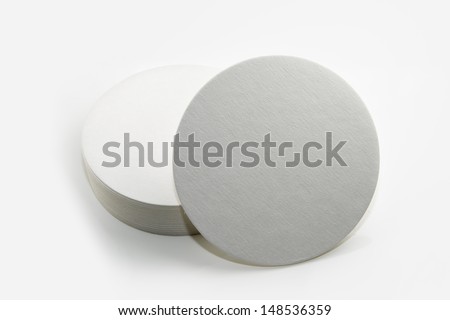 Stack of new beer coasters isolated on a white background. Add your own design or logo. Royalty-Free Stock Photo #148536359